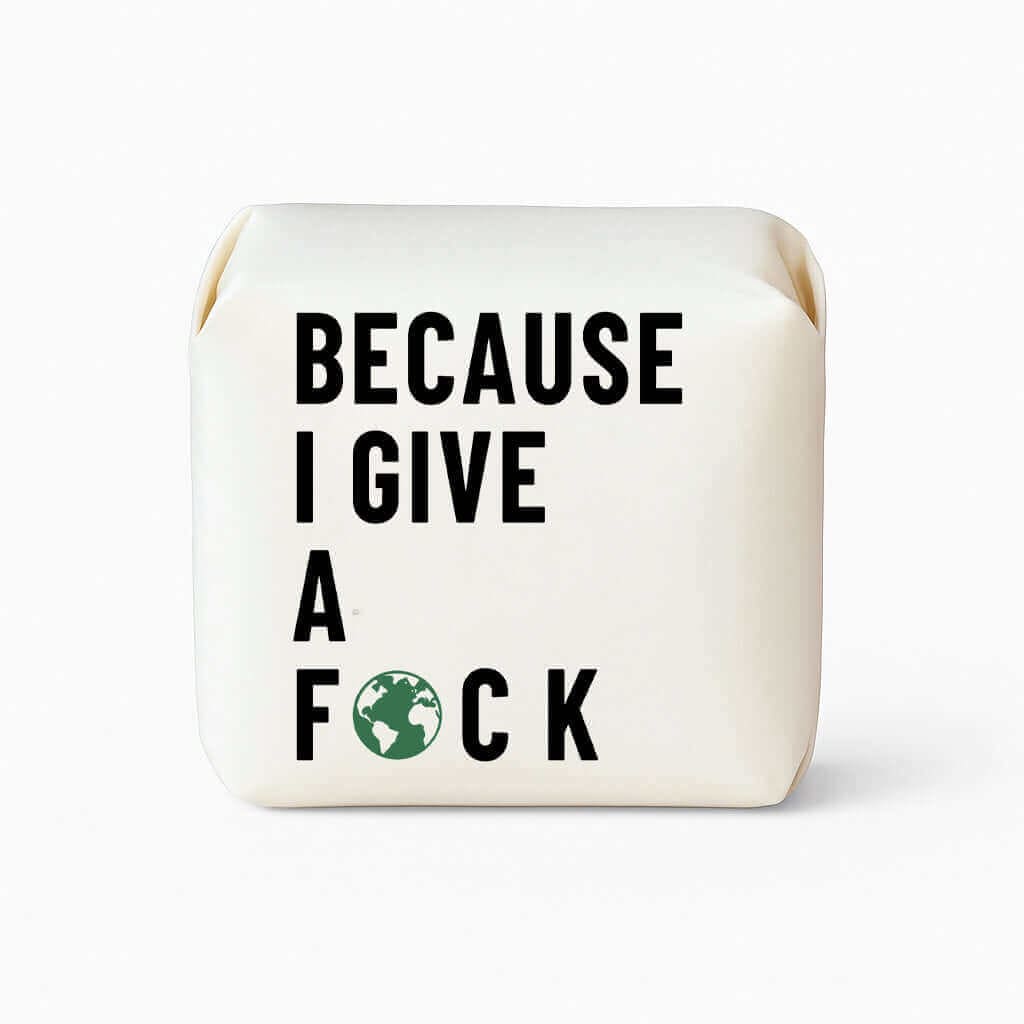 Bar of soap with text 'BECAUSE I GIVE A F*CK' on a white background