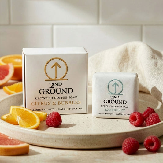 Citrus BOGO Set (Buy Full Size, Get Raspberry Guest Bar Free) with upcycled coffee soap bars on a plate.