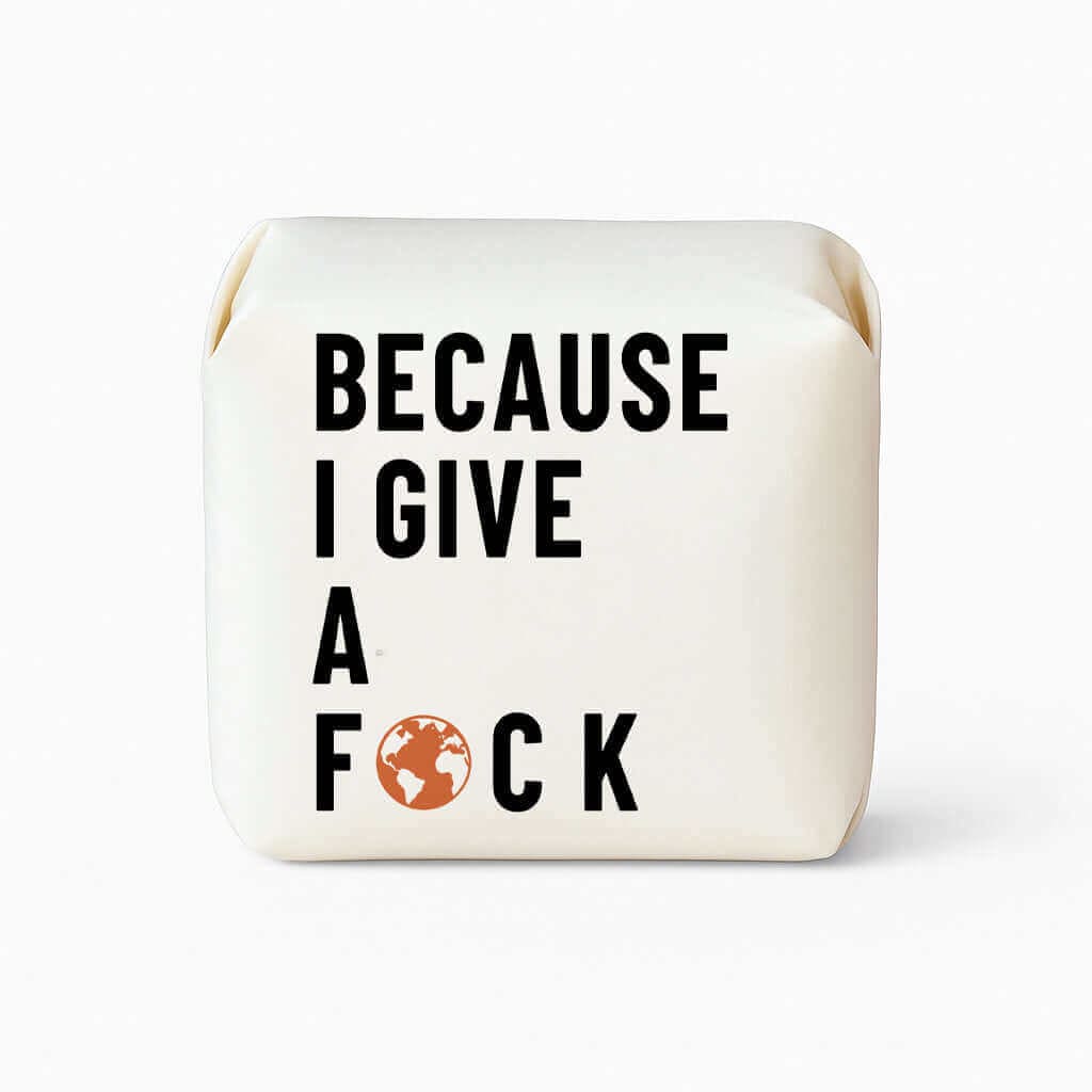 White soap bar with black text 'BECAUSE I GIVE A F*CK' on a white background