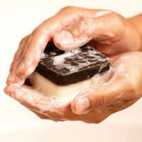 Double Shot - 2 Pack of Upcycled Coffee Soaps, 2-in-1 exfoliating soap bar lathering with gritty texture and real coffee grounds.