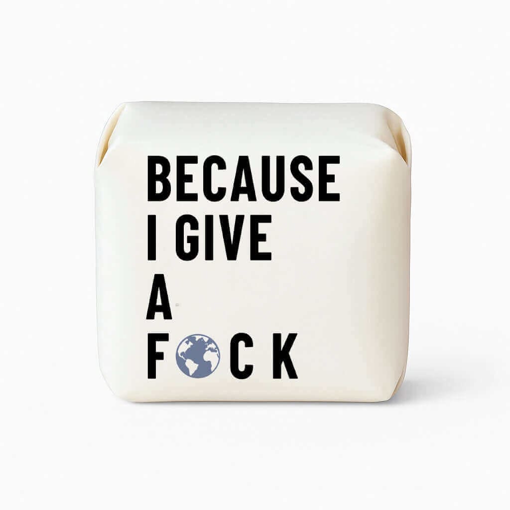 White soap bar with black text 'BECAUSE I GIVE A F*CK' on a white background
